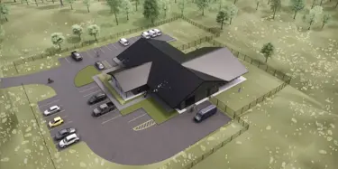 aerial view of building and parking lot