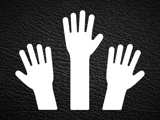 White icon of three raised hands on leather background