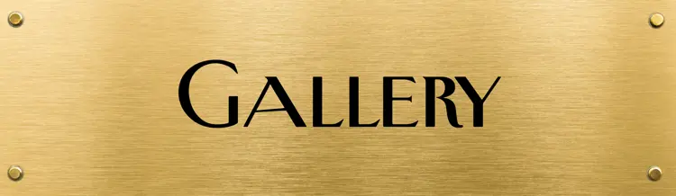 Gold plaque with centred black text reading "Gallery"