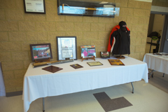 display with photos and jacket