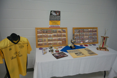 display with photos, medals, trophies and jersey