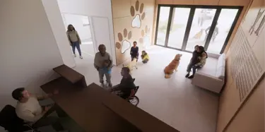 interior lobby with patrons and animals