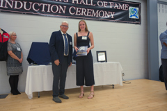 young woman receiving award
